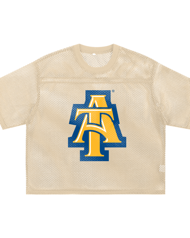 Beige mesh sports jersey with a A&T or NCA&T logo 
