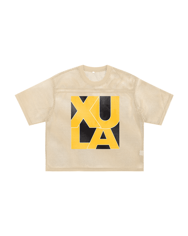 Cream jersey with a XULA Xavier University of Louisiana logo